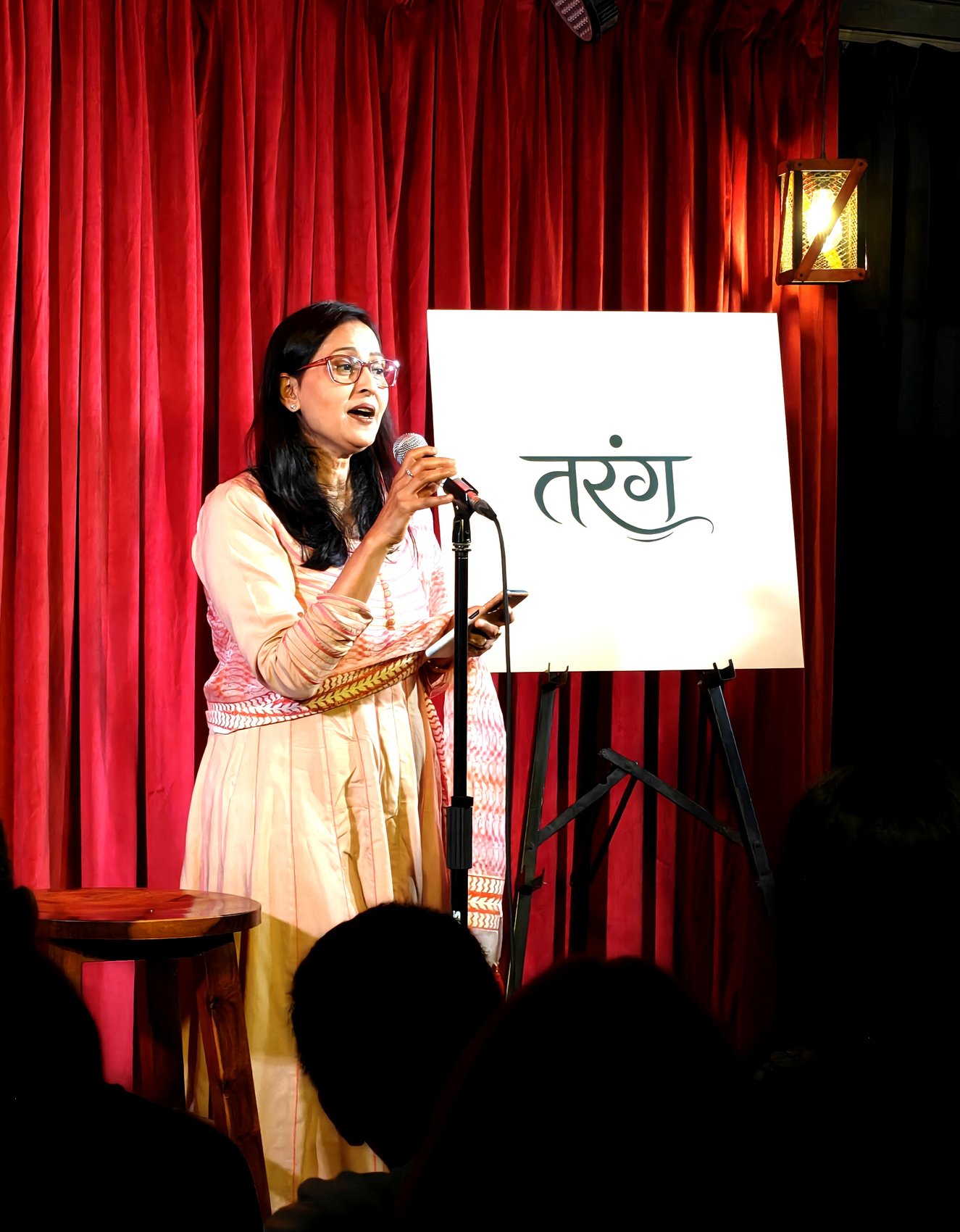 Speaker performing at Tarang open mic